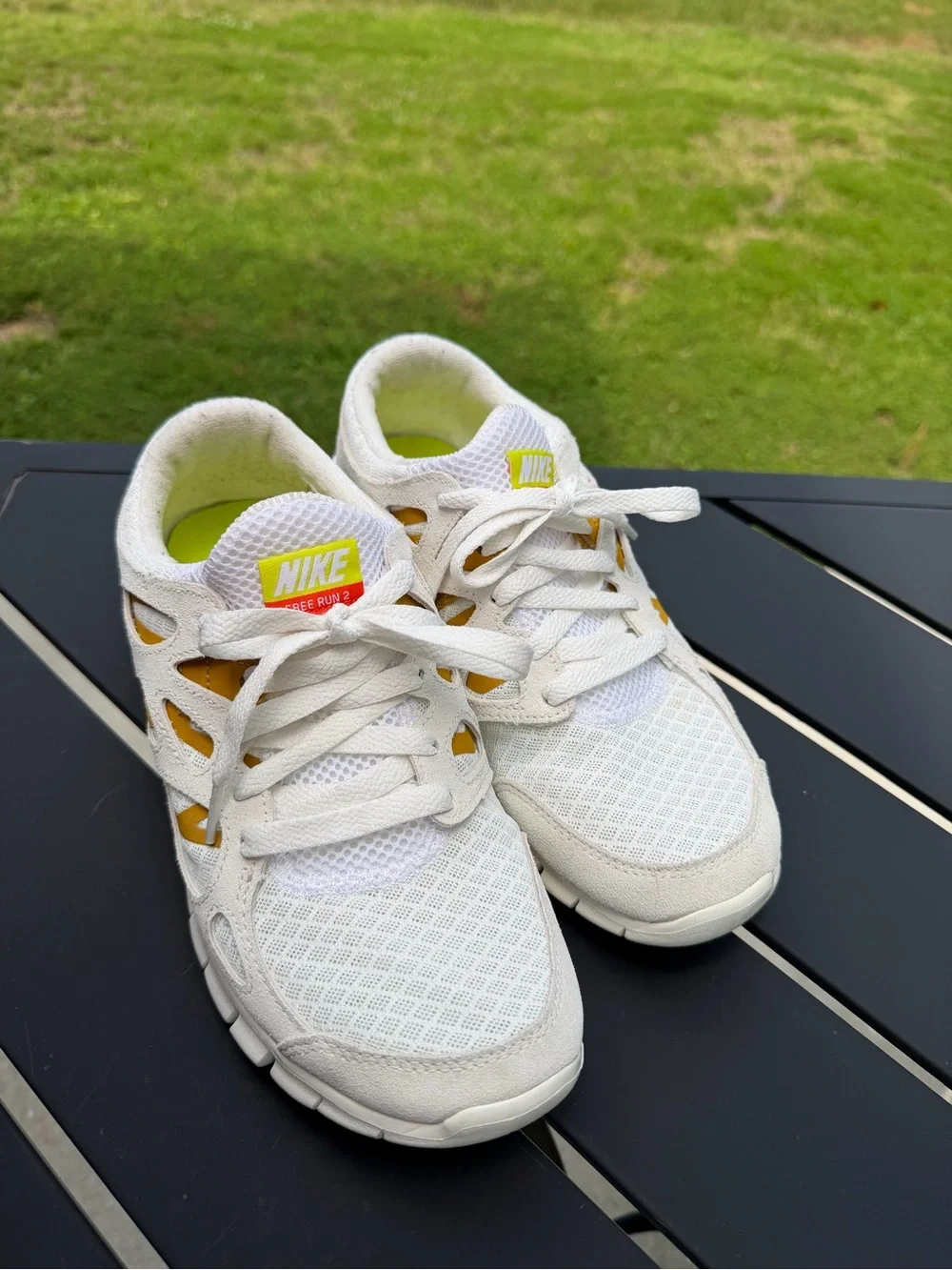Nike White and Yellow Mesh Athletic Sneakers with Red Swoosh